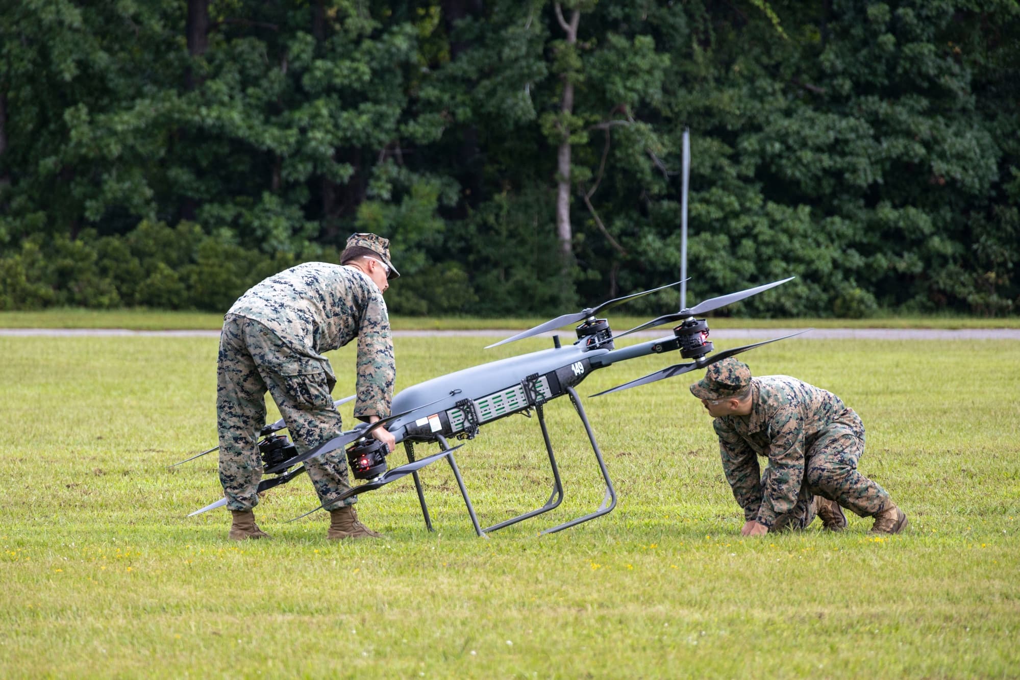 U.S. Marines inspect an unmanned aircraft during training