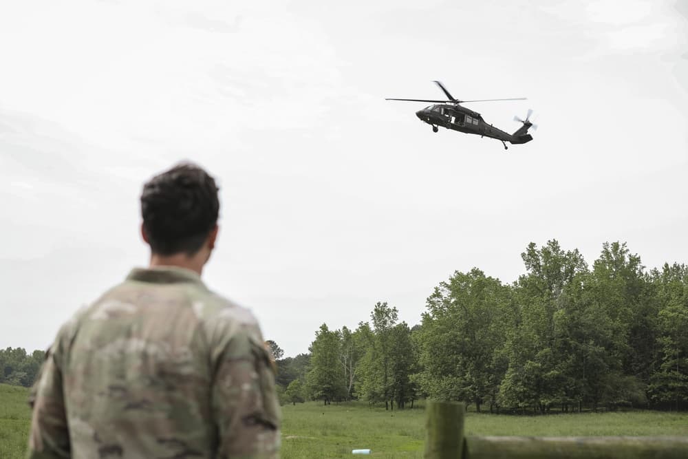 U.S. Army Rangers conduct an airborne training jump from a UH-60 Black Hawk helicopter