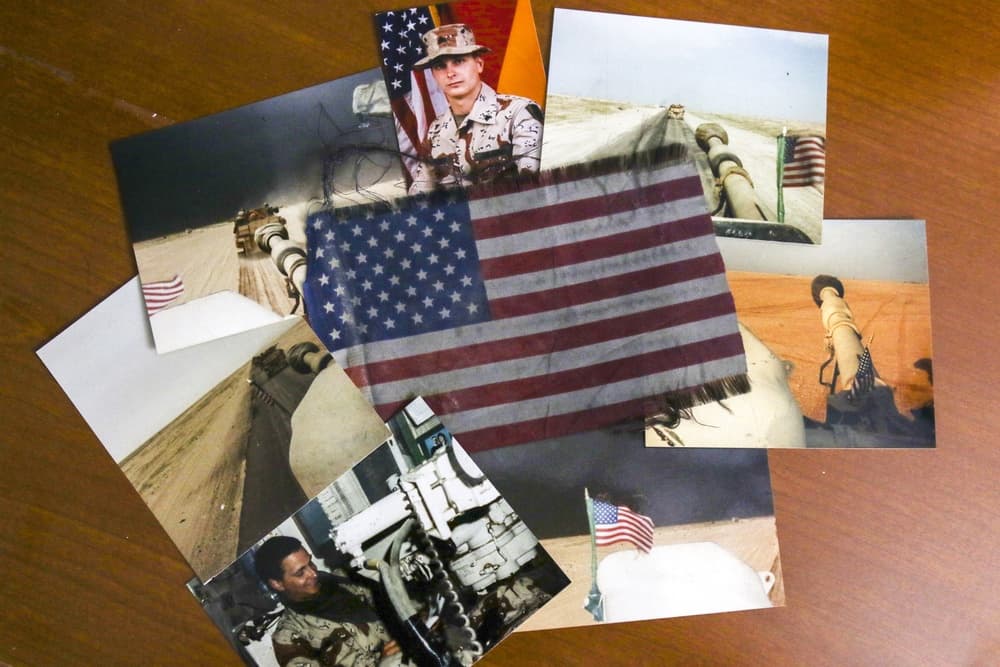 Bob Lehtonen's Desert Storm photographs and flag displayed together